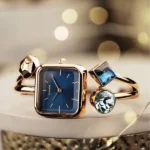 Sonata Aura Quartz Analog Blue Dial Rose Gold Stainless Steel Strap Watch For Women