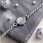 Vyb Siren By Fastrack Quartz Analog White Mother of Pearl Dial Silver Stainless Steel Strap Watch For Girls