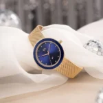 Vyb Lumina By Fastrack Quartz Analog Blue Dial Rose Gold Stainless Steel Strap Watch For Girls